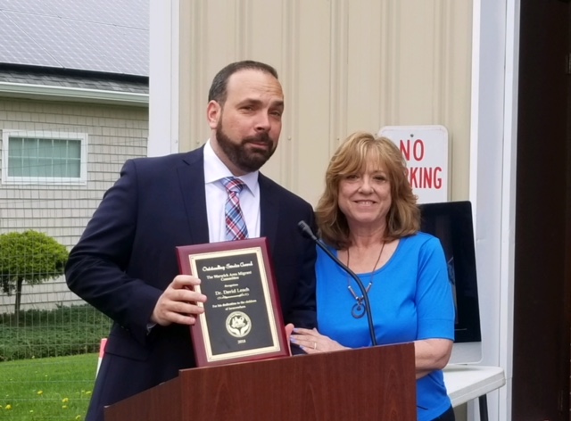 Dr. David Leach Receives Outstanding Service Award from the Warwick Area Migrant Committee